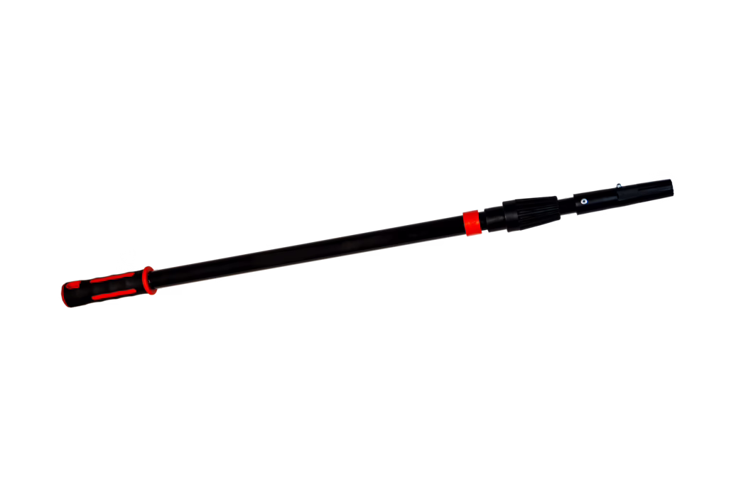 Pajarito_Dummy_189028_189029_189030_Telescopic rod Pajaclick_2026-03 A black telescopic extension pole with red accent rings and an ergonomic red-and-black rubber handle. The pole appears to be made of lightweight metal or reinforced plastic and features a straight shaft with an adjustable locking mechanism near the working end plus a connector for attaching tools such as paint rollers, brushes or cleaning heads. The matte black surface contrasts with the red trim and the grip has textured rubber inserts for slip resistance. The image shows the pole isolated on a white background, photographed diagonally to emphasize the handle and adjustable coupling.